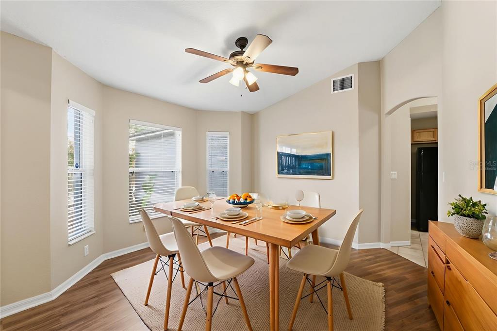 13477 Amanda Avenue Spring Hill, FL 34609 - Photo 10 of 46 a dining room with furniture and window