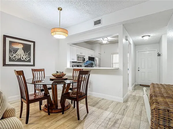 $1,975 | 1044 Woodshire Lane, Unit B102, Naples, FL 34105