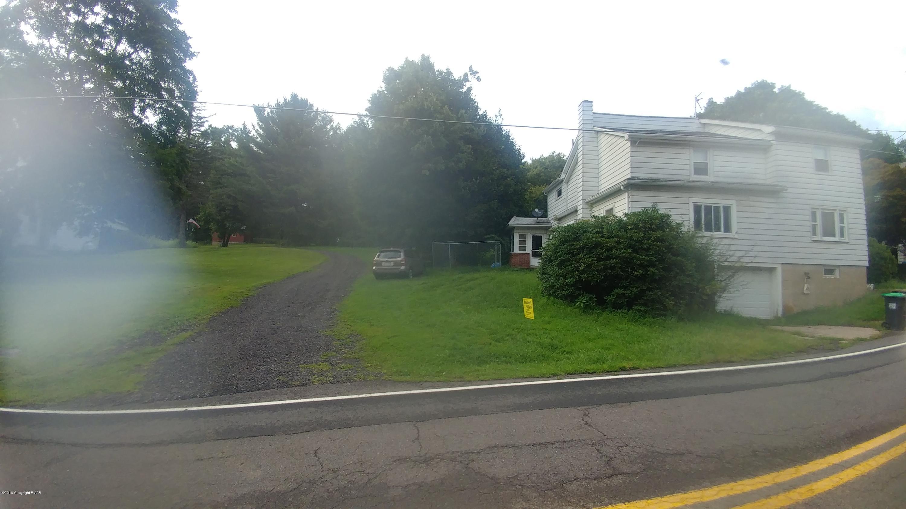 604 Lilly Lake Road Wapwallopen, PA 18660 - Photo 1 of 16 a view of a house with a yard
