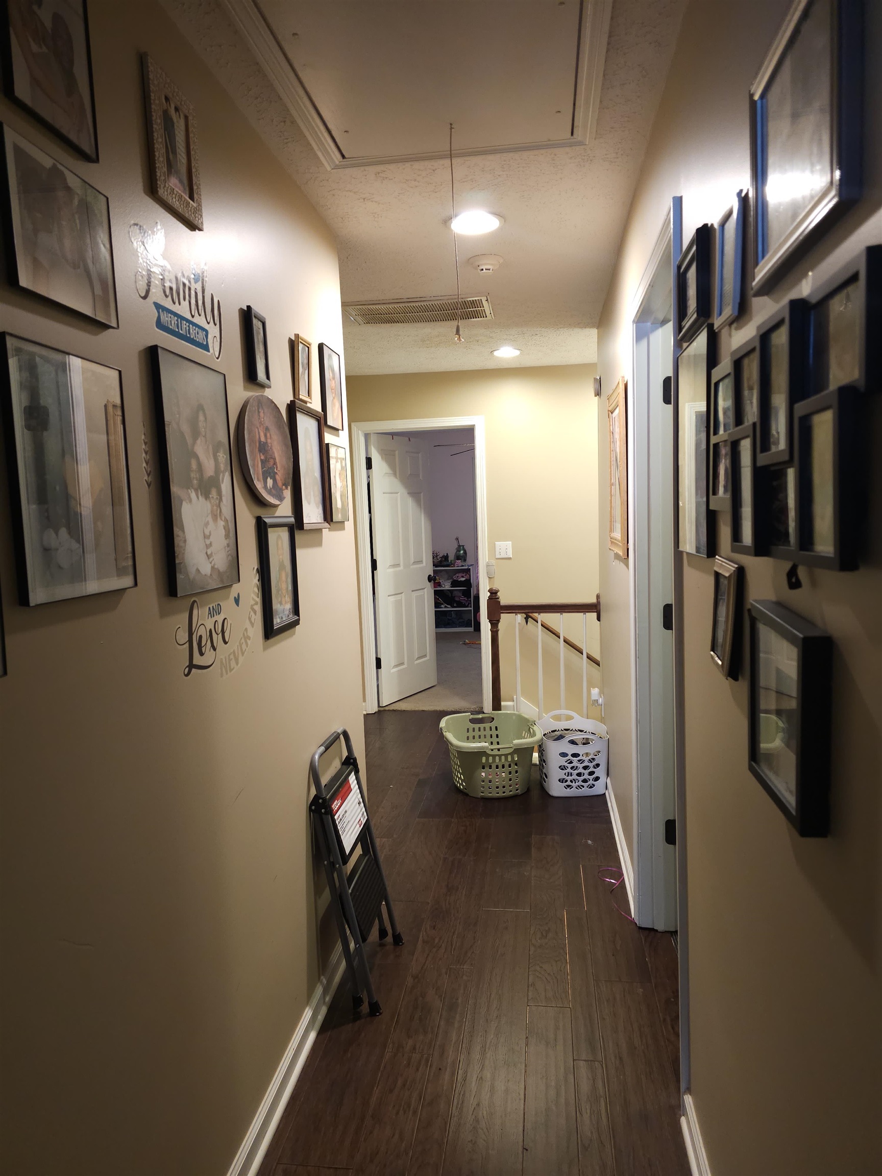 109 Sebastian Drive Jackson, TN 38305 - Photo 12 of 24 Corridor featuring an upstairs landing and dark wood finished floors