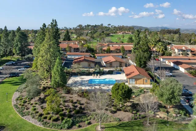 a view of a city with mountains in the background