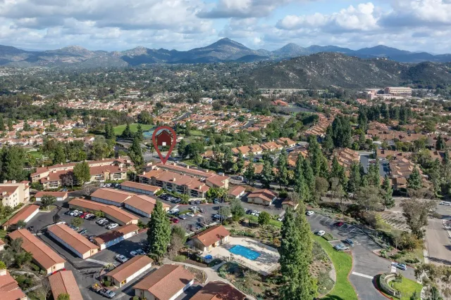 a view of a garden with an ocean