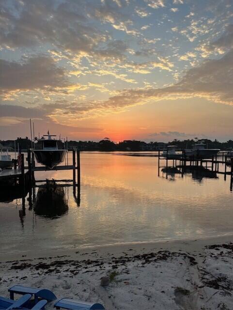 18896 Point Drive Tequesta, FL 33469 - Photo 59 of 62 a view of a lake with a big yard