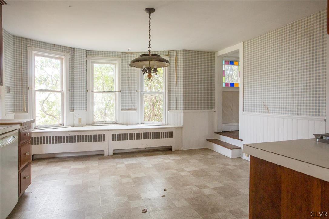 6293 Sullivan Trail Nazareth, PA 18064 - Photo 7 of 32 a spacious bedroom with a bed and a chandelier