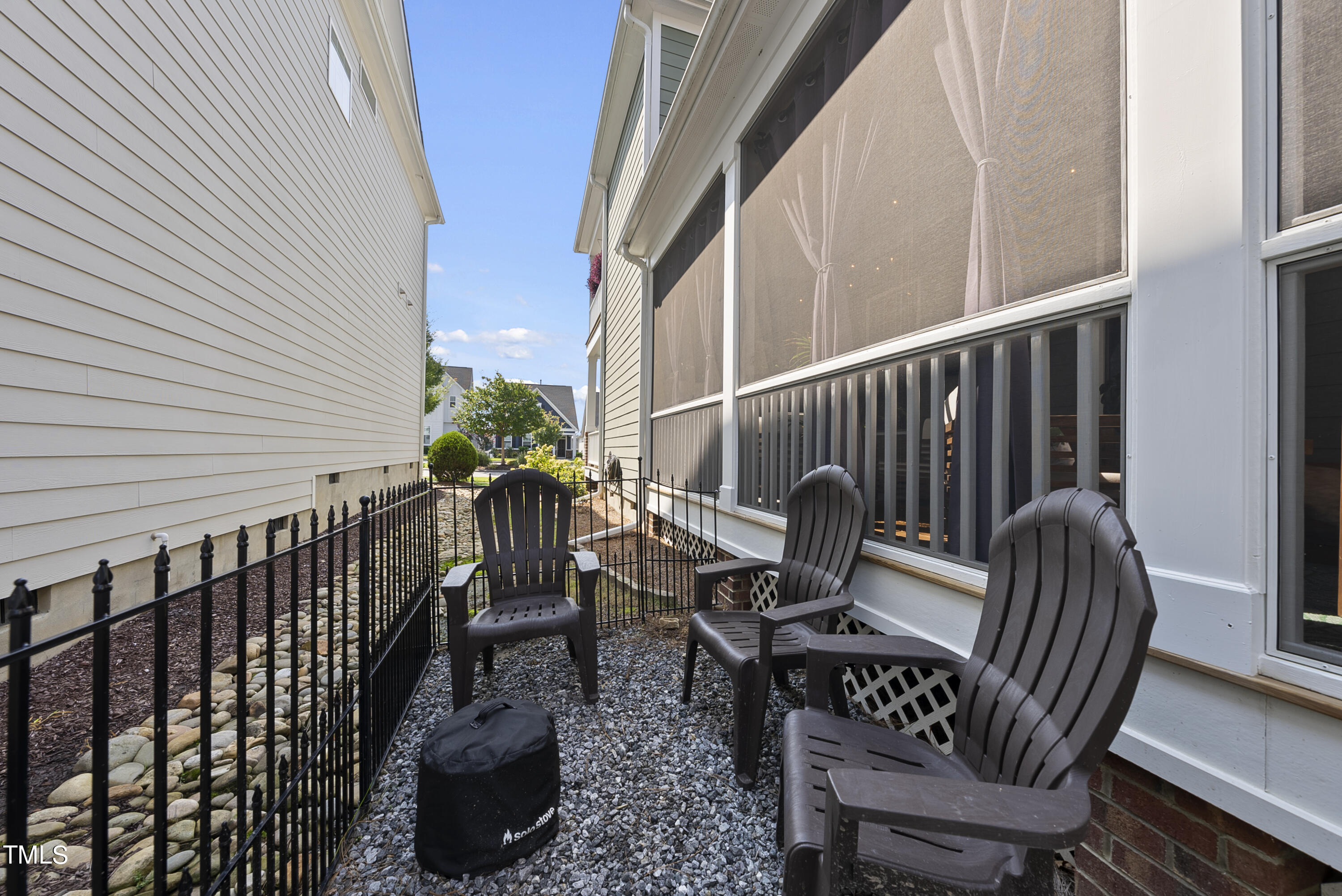 5205 Beckom Street Raleigh, NC 27616 - Photo 35 of 37 side fenced area of house is perfect for grilling