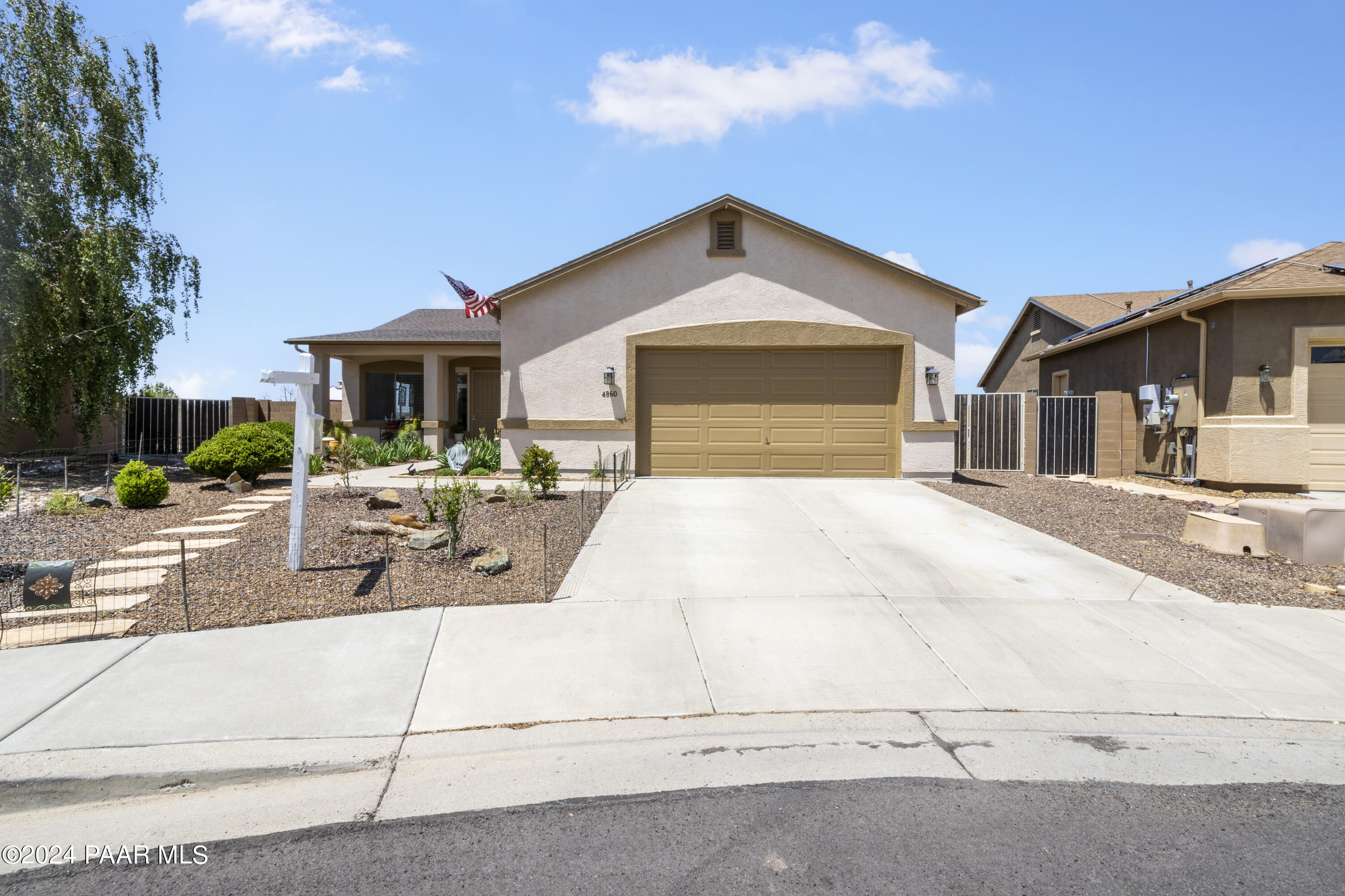 4860 Edgemont Road Prescott Valley, AZ 86314 - Photo 2 of 32 a view of a house with a yard