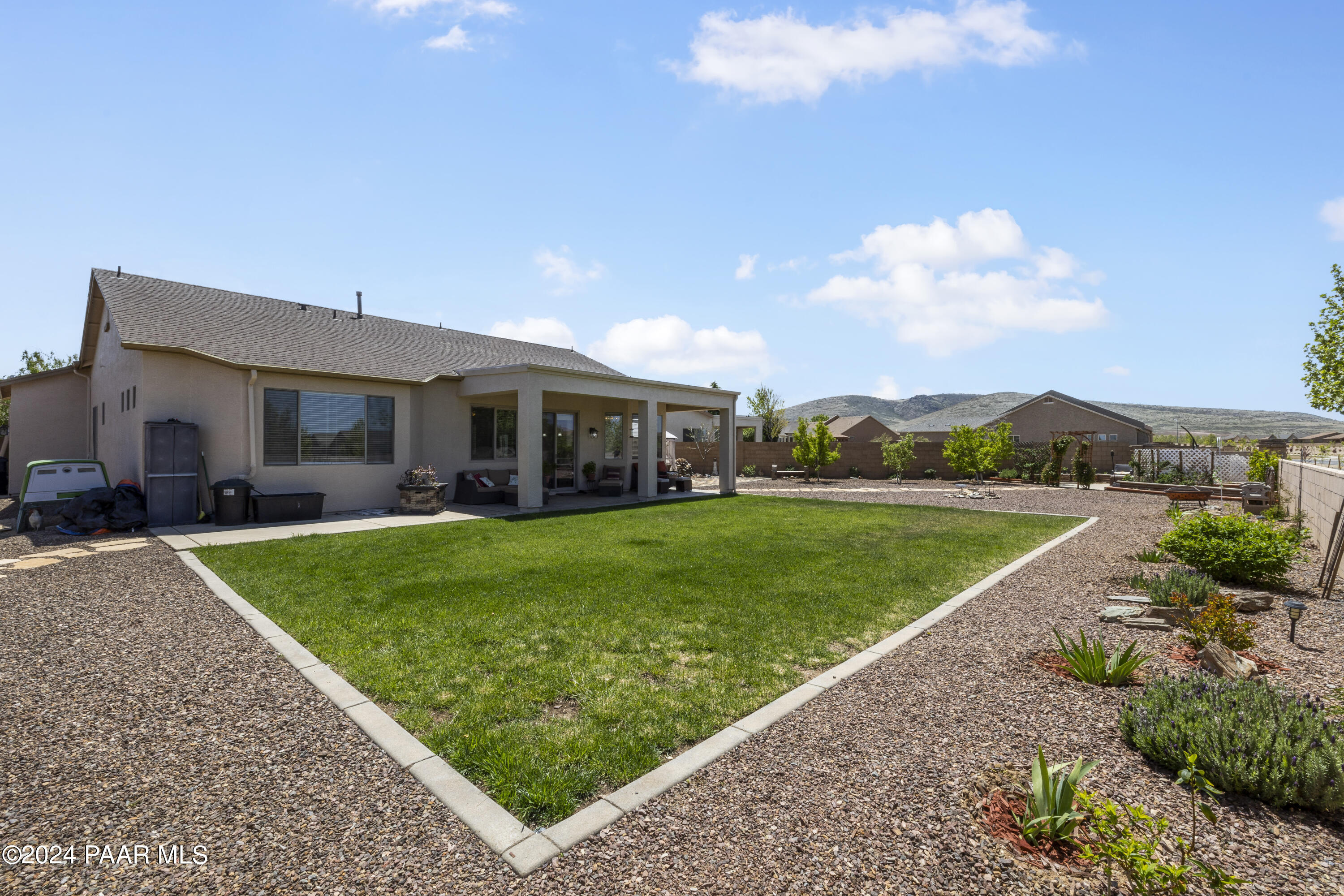 4860 Edgemont Road Prescott Valley, AZ 86314 - Photo 32 of 32 a view of a house with a backyard