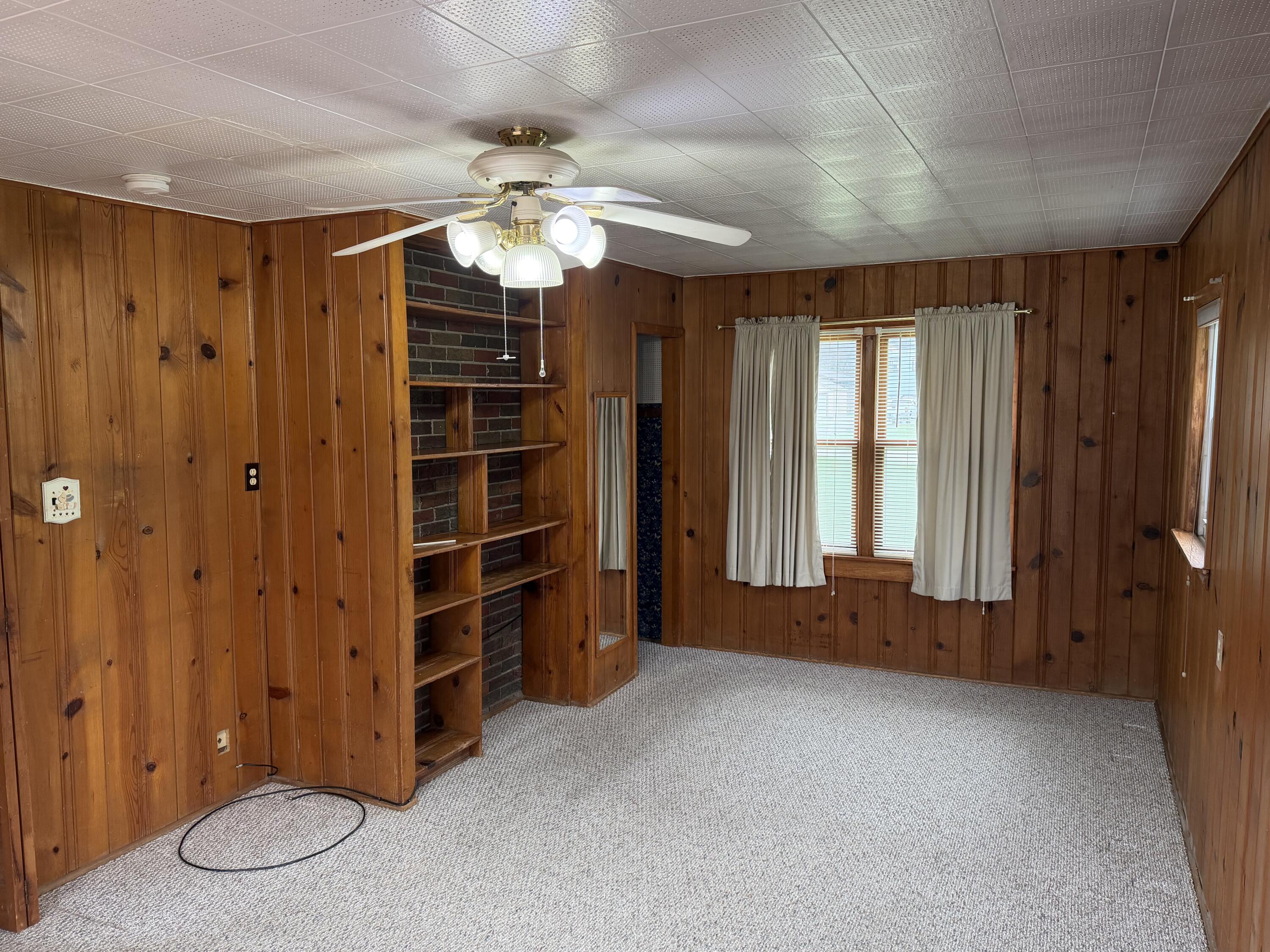 2945 Monnier Street Portage, IN 46368 - Photo 15 of 32 wooden floor and windows in a room