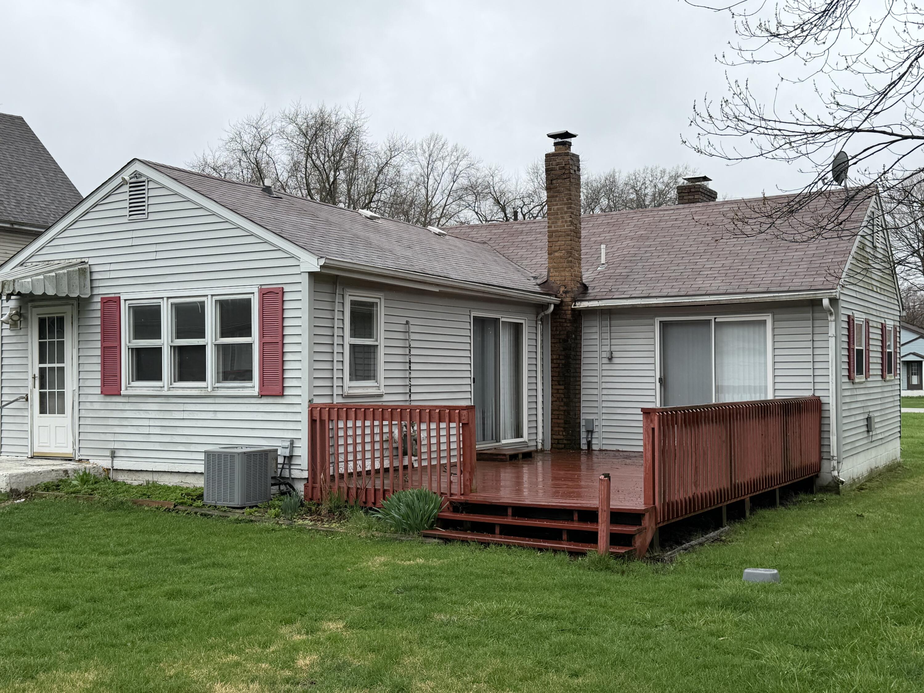 2945 Monnier Street Portage, IN 46368 - Photo 27 of 32 a front view of a house with garden
