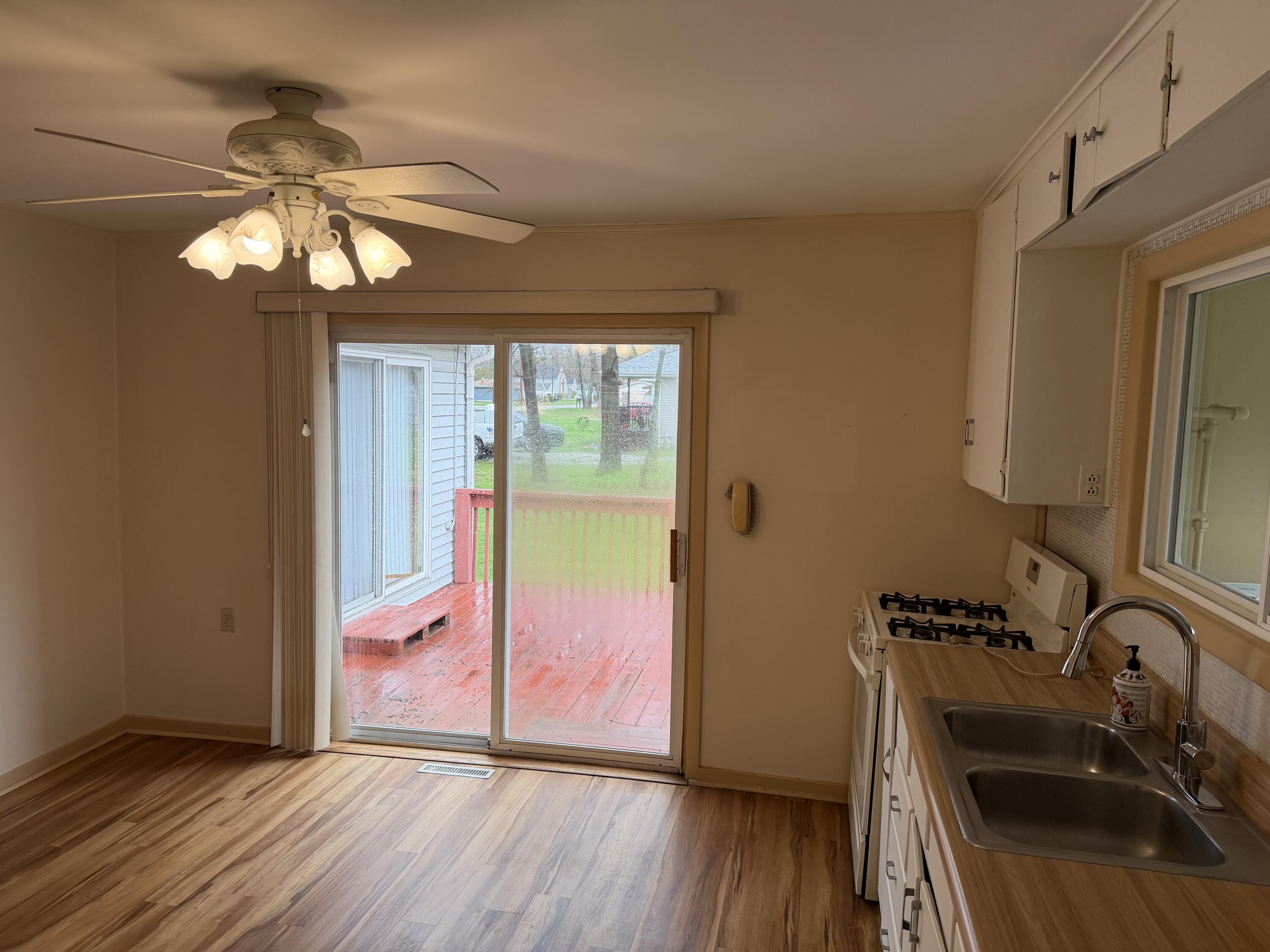 2945 Monnier Street Portage, IN 46368 - Photo 6 of 32 a bathroom with a sink and a mirror