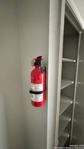 a room with storage and utility