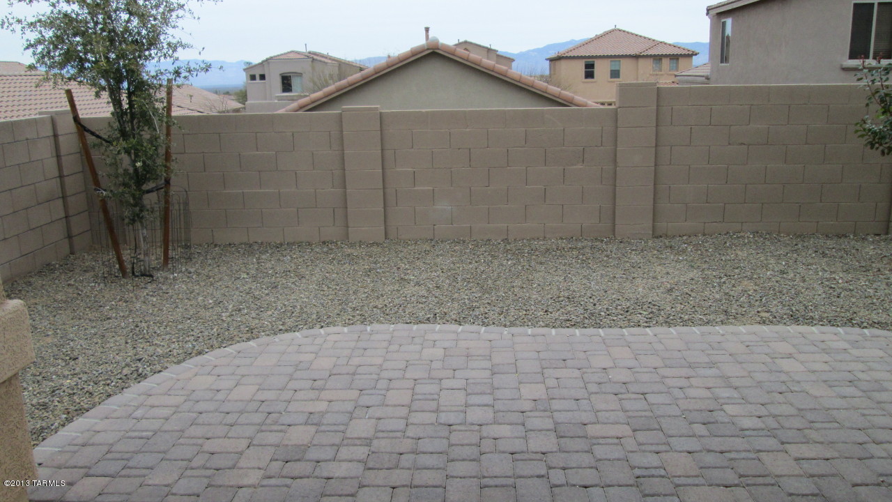 10855 East New Rock Ridge Drive Vail, AZ 85641 - Photo 25 of 34 a view of a house with a yard
