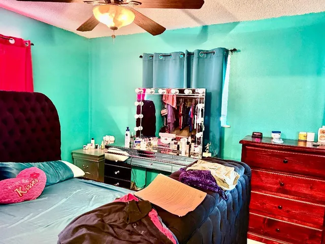 a bed room with a bed and a bed