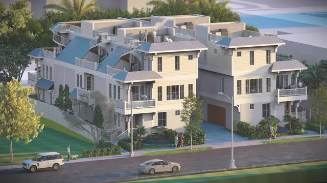 a front view of a residential apartment building with a yard