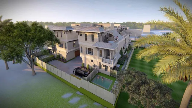 an aerial view of a house with a garden and trees