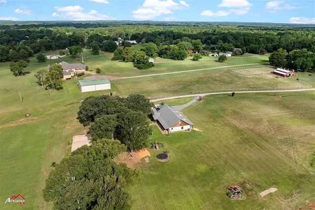 a view of a lake with a yard