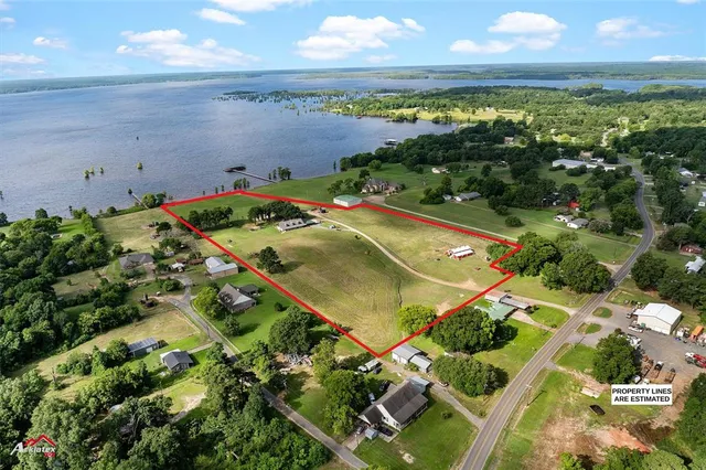 a view of a lake with a big yard