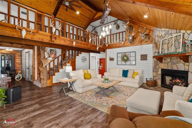 a kitchen with a table chairs stove and cabinets