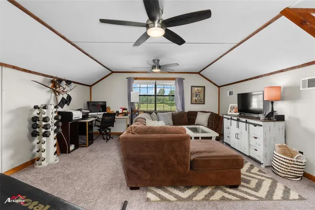 a view of swimming pool with outdoor seating and yard