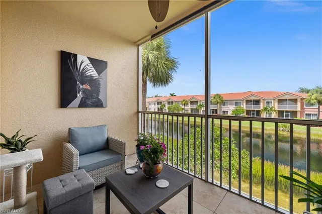 a view of a balcony with chairs