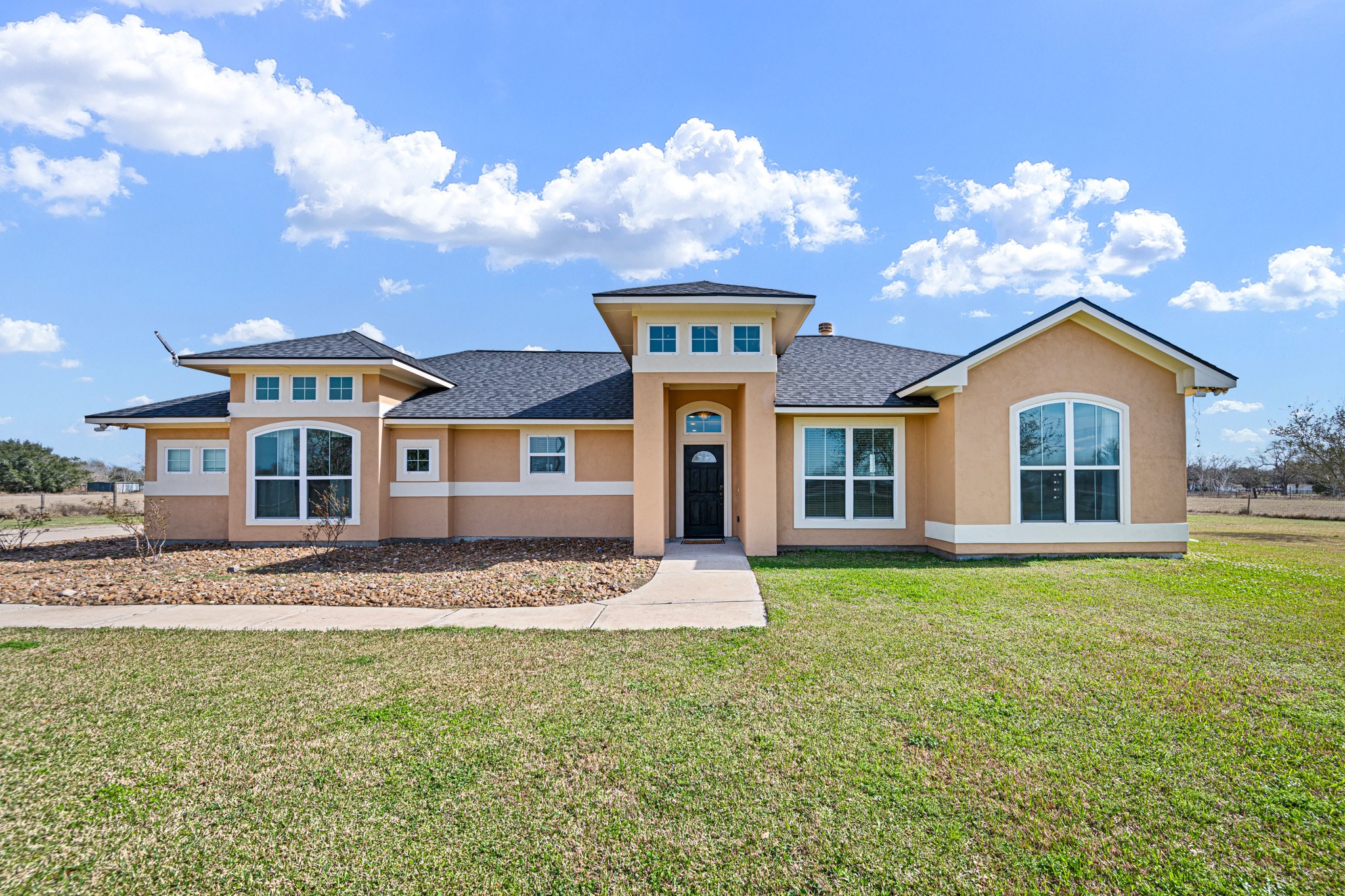 8131 Brinkmeyer Road Needville, TX 77461 - Photo 3 of 34 Features a stucco exterior with a New roof (9/2025).