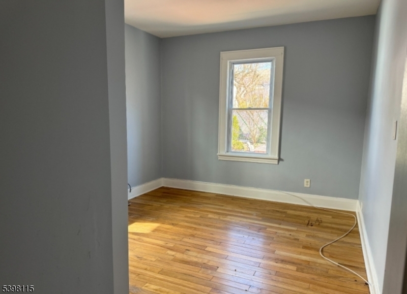 70 Elliot Street, Unit 1 Passaic, NJ 07055 - Photo 11 of 15 a view of an empty room and window