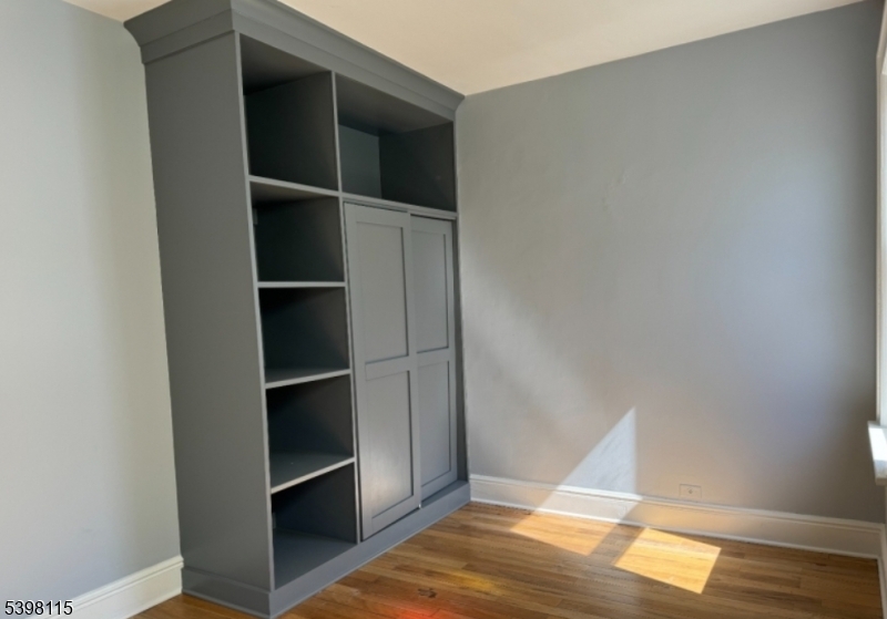 70 Elliot Street, Unit 1 Passaic, NJ 07055 - Photo 13 of 15 a view of an empty walk in closet
