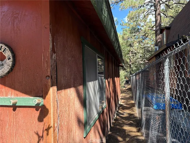 a view of balcony with wooden floor
