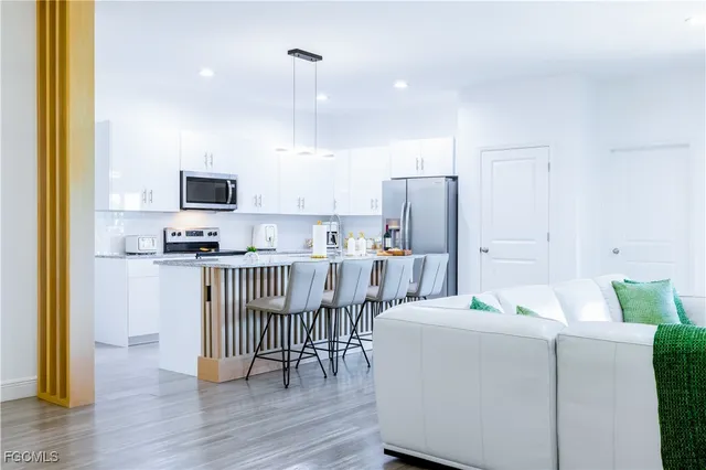 a bedroom with a bed and a mirror