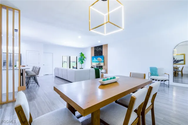 a bedroom with a bed and a table