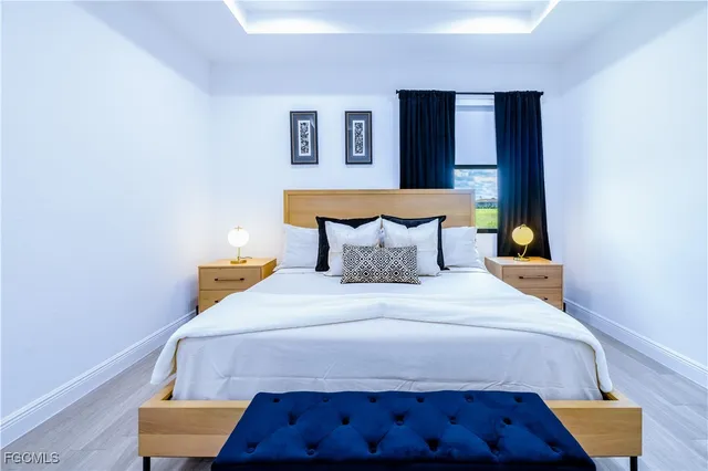 an aerial view of a house with a ocean view