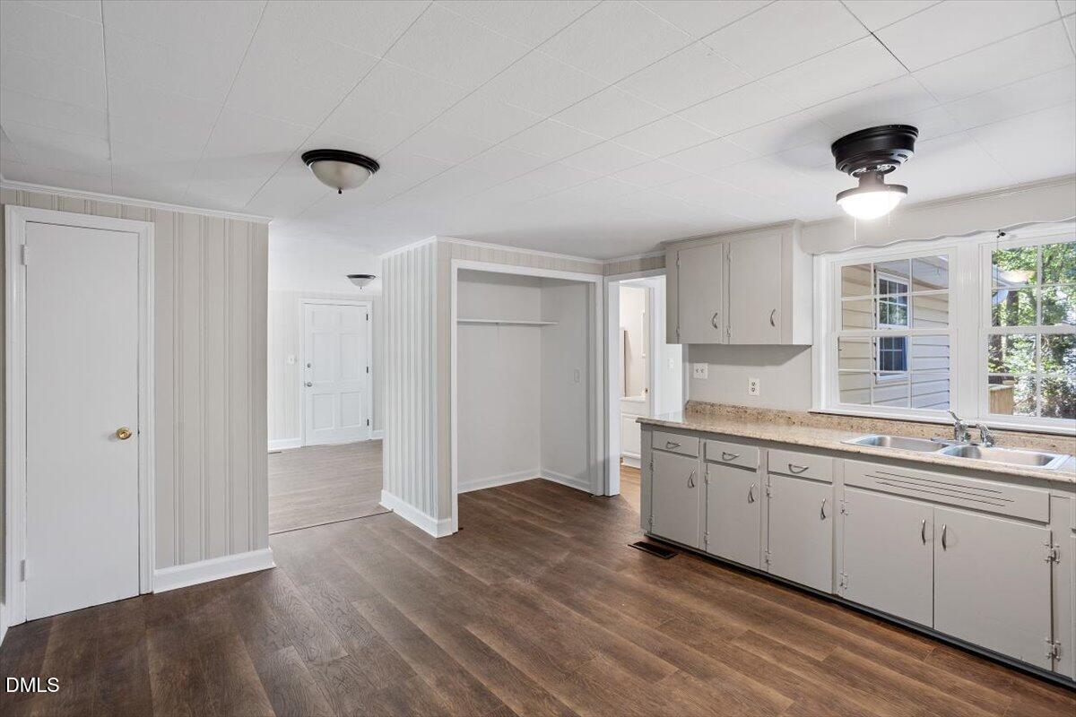 2008 Angier Road Fuquay-Varina, NC 27526 - Photo 17 of 34 a view of a kitchen with a sink and wooden floor