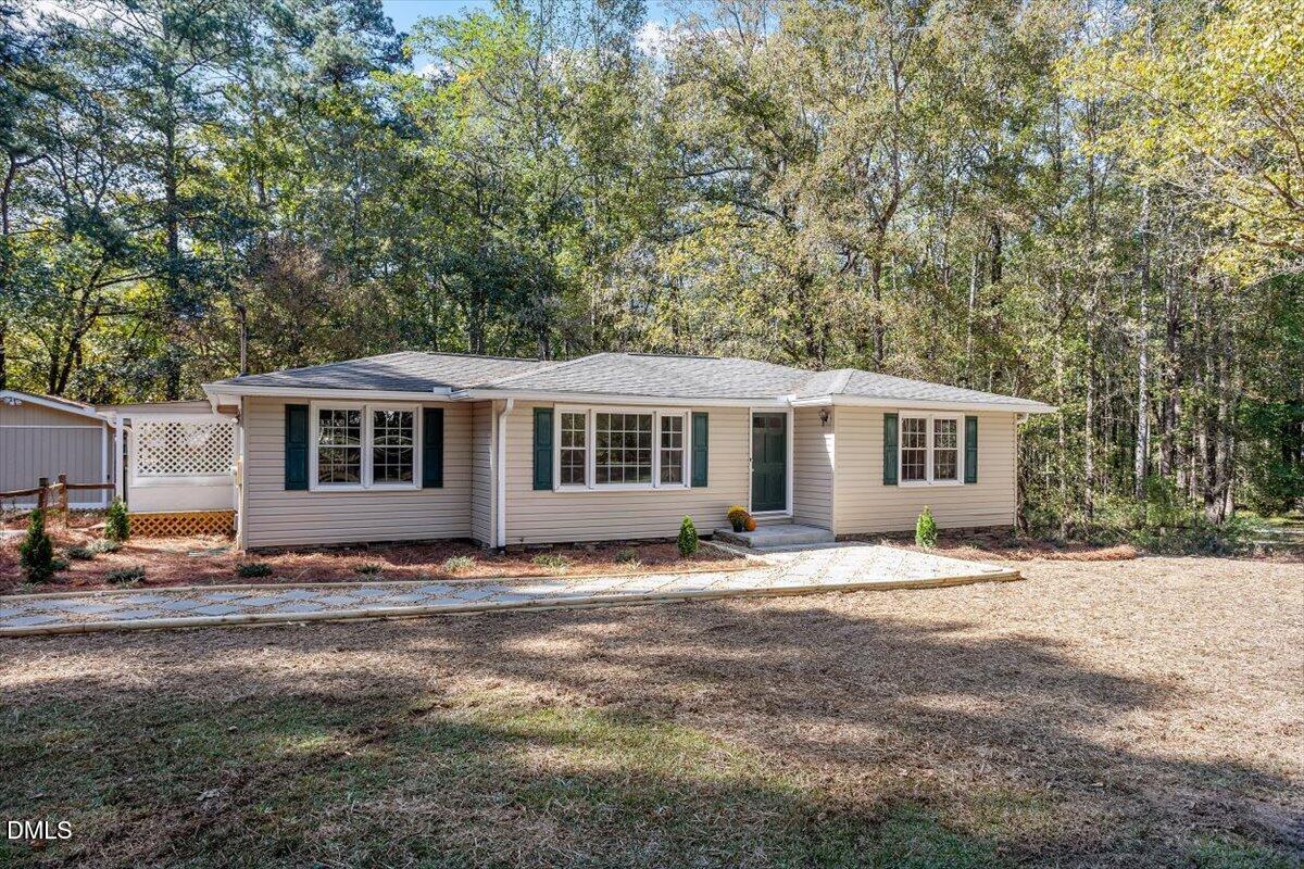 2008 Angier Road Fuquay-Varina, NC 27526 - Photo 3 of 34 a view of a house with a yard