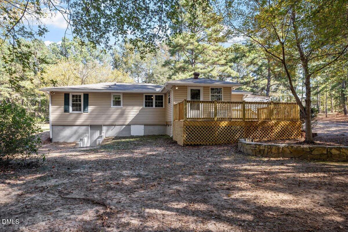 2008 Angier Road Fuquay-Varina, NC 27526 - Photo 31 of 34 a view of a house with a yard