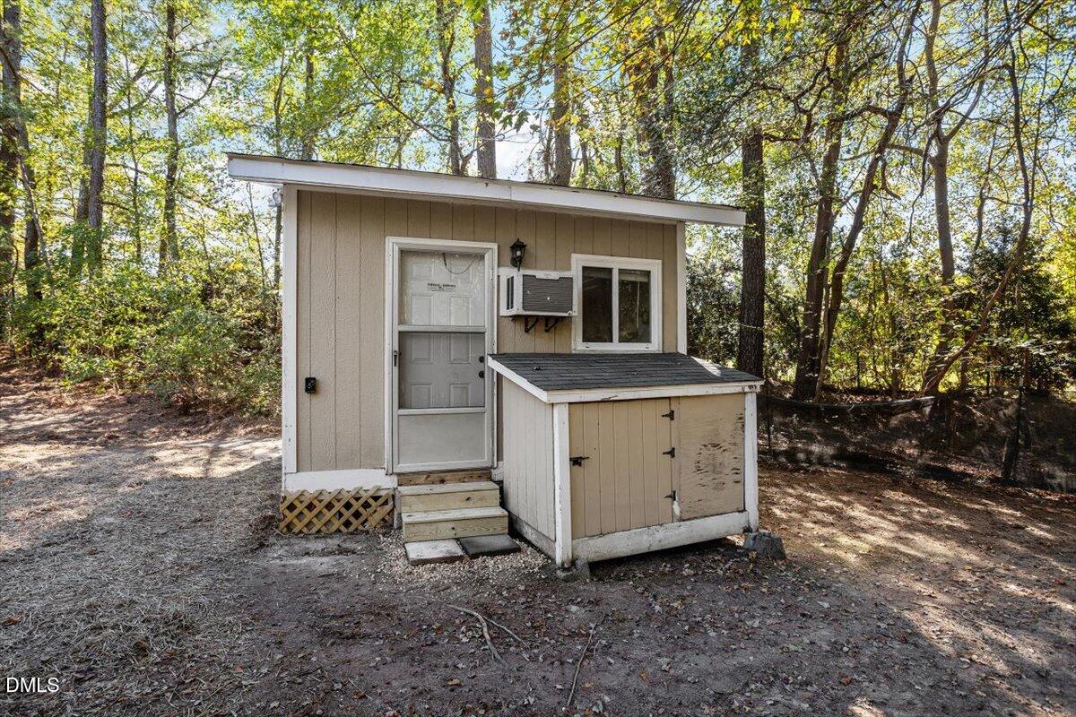 2008 Angier Road Fuquay-Varina, NC 27526 - Photo 33 of 34 a view of a house with a backyard
