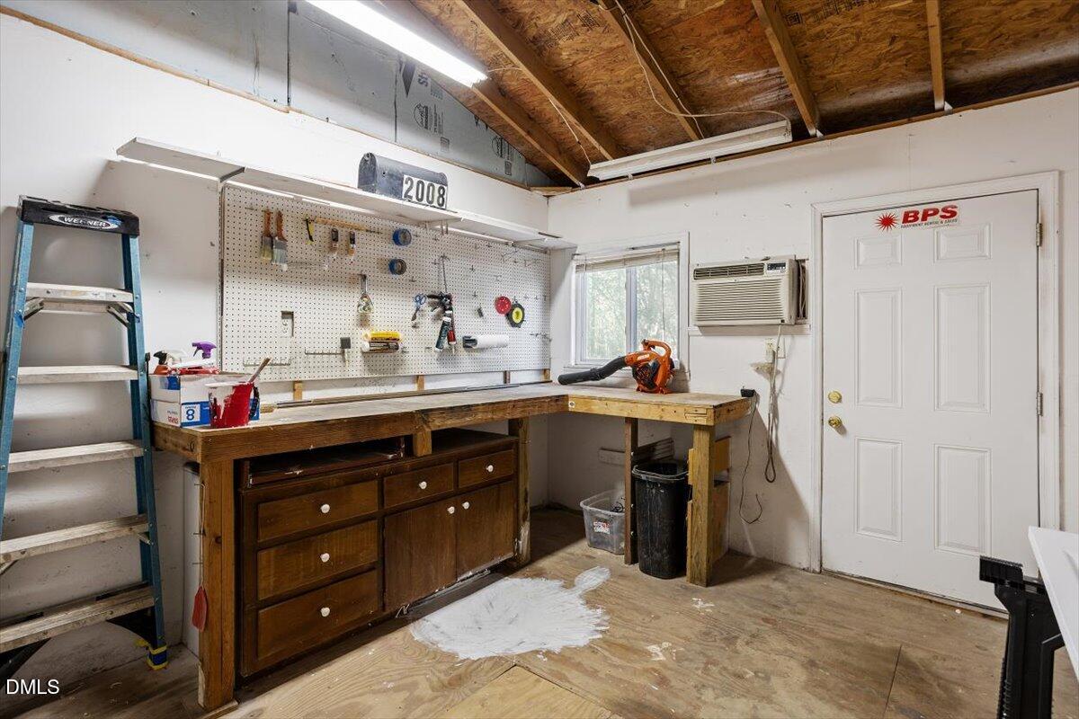 2008 Angier Road Fuquay-Varina, NC 27526 - Photo 34 of 34 a bed room with a bed and a television