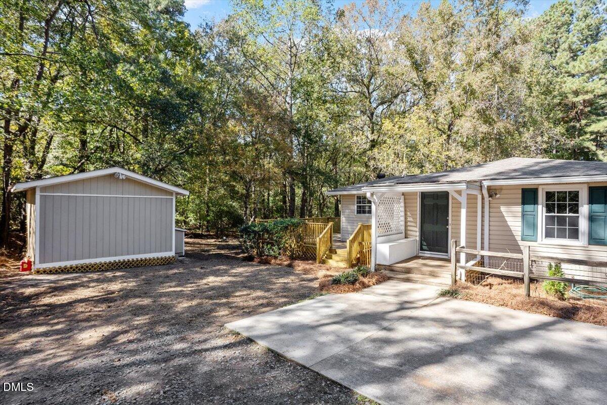 2008 Angier Road Fuquay-Varina, NC 27526 - Photo 7 of 34 a view of a house with backyard and sitting area