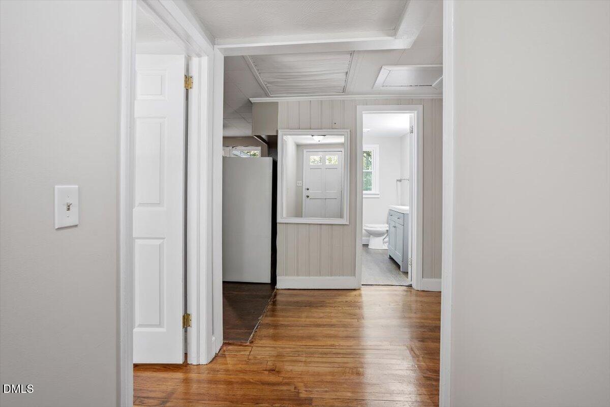 2008 Angier Road Fuquay-Varina, NC 27526 - Photo 8 of 34 a view of a room with wooden floor and a bathroom