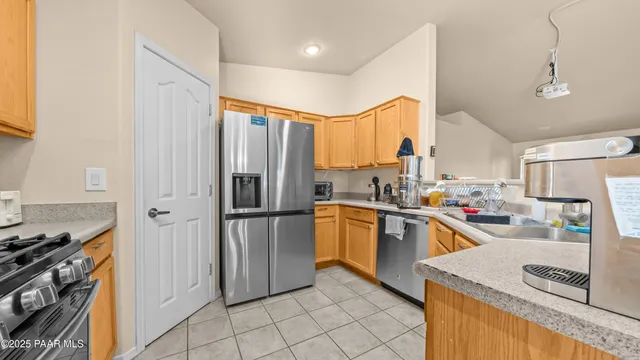 a bathroom with a sink a toilet and vanity
