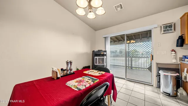 a view of a workspace with furniture and toys