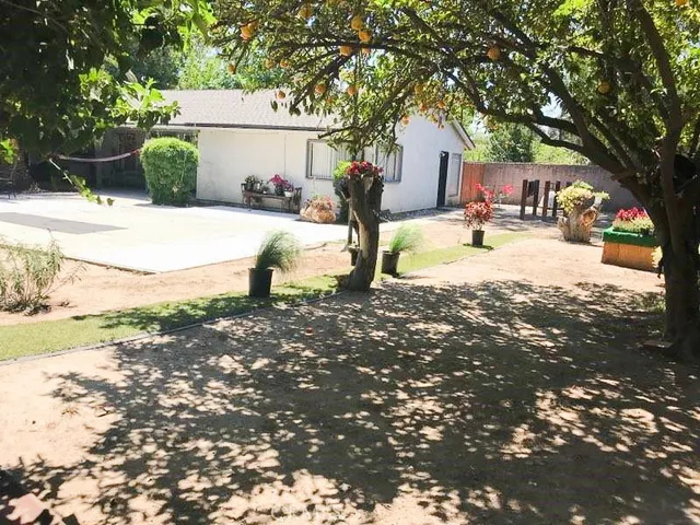 a house view with a outdoor space