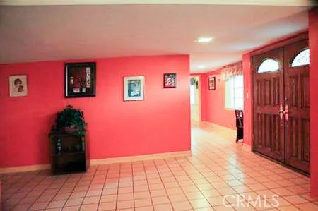 a view of a livingroom with a furniture and entryway