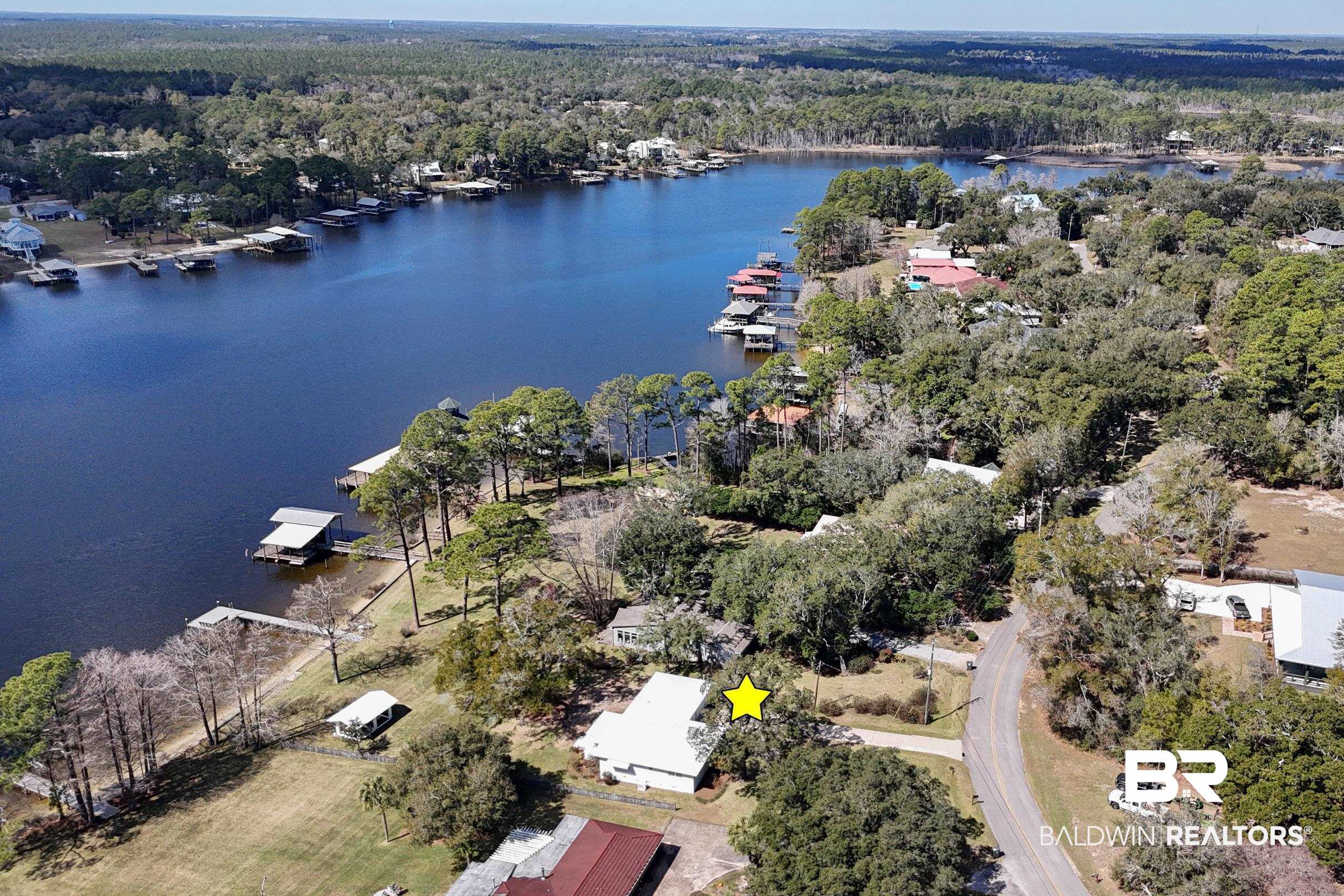 9459 Soldier Creek Road Lillian, AL 36549 - Photo 49 of 54 Aerial view featuring a water view and a wooded view