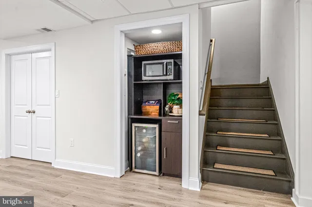 a view of a house with a yard and plants