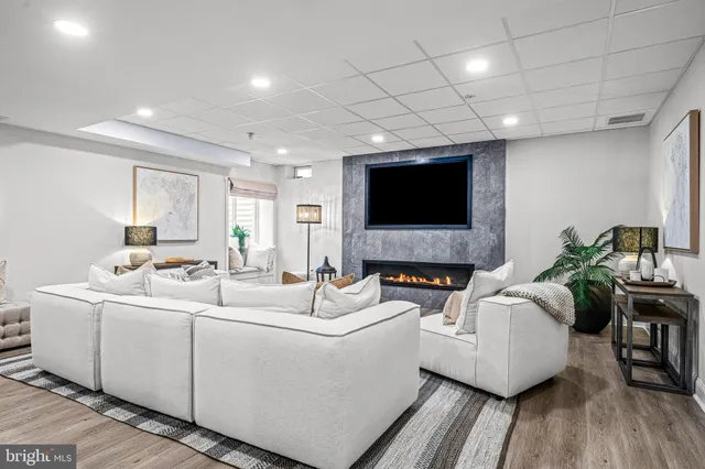 a view of a chairs and table in the balcony