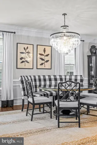 a spacious bedroom with a bed and a couch