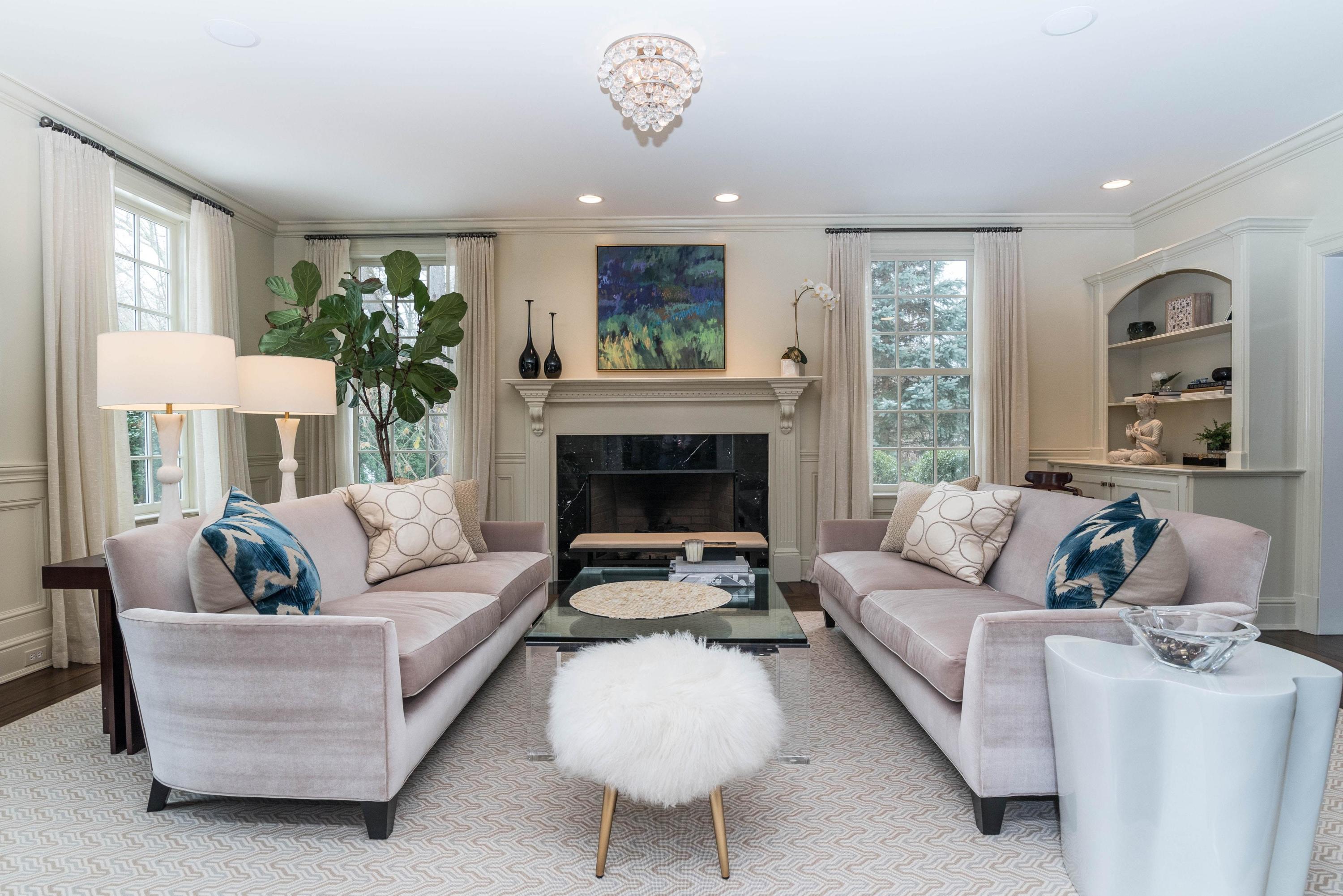 48 Leeuwarden Road Darien, CT 06820 - Photo 12 of 35 a living room with furniture and a fireplace