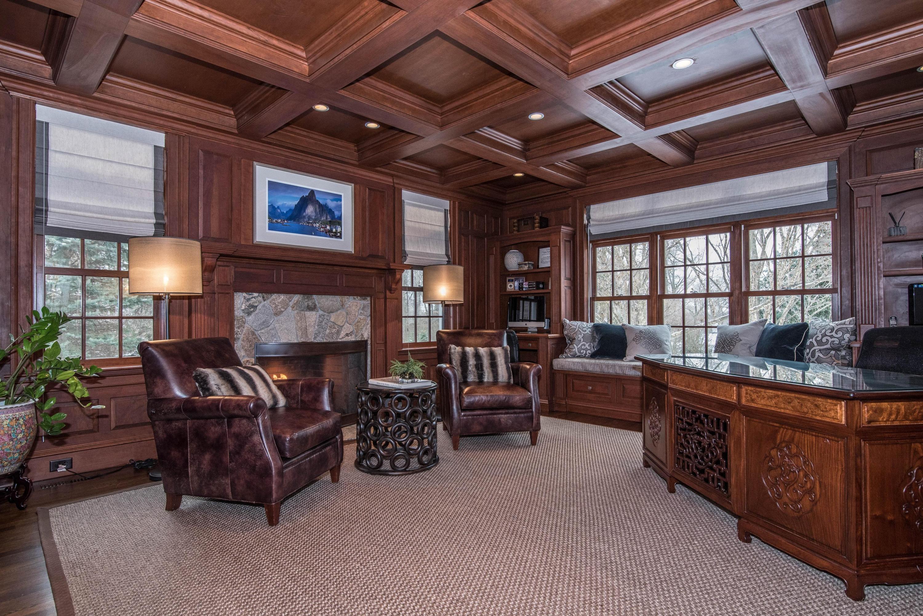 48 Leeuwarden Road Darien, CT 06820 - Photo 13 of 35 a living room with furniture and a fireplace