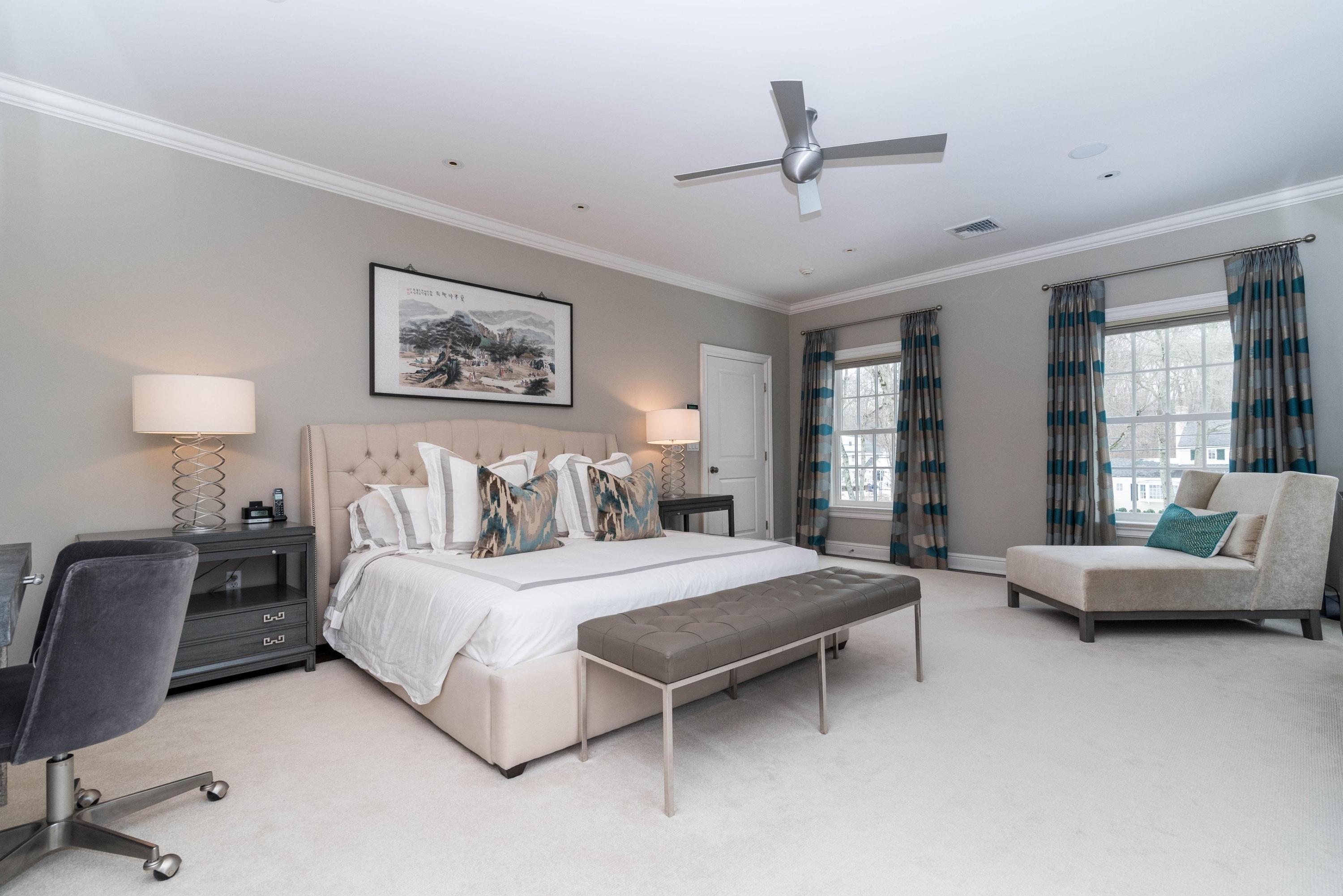 48 Leeuwarden Road Darien, CT 06820 - Photo 15 of 35 a bedroom with a bed and furniture