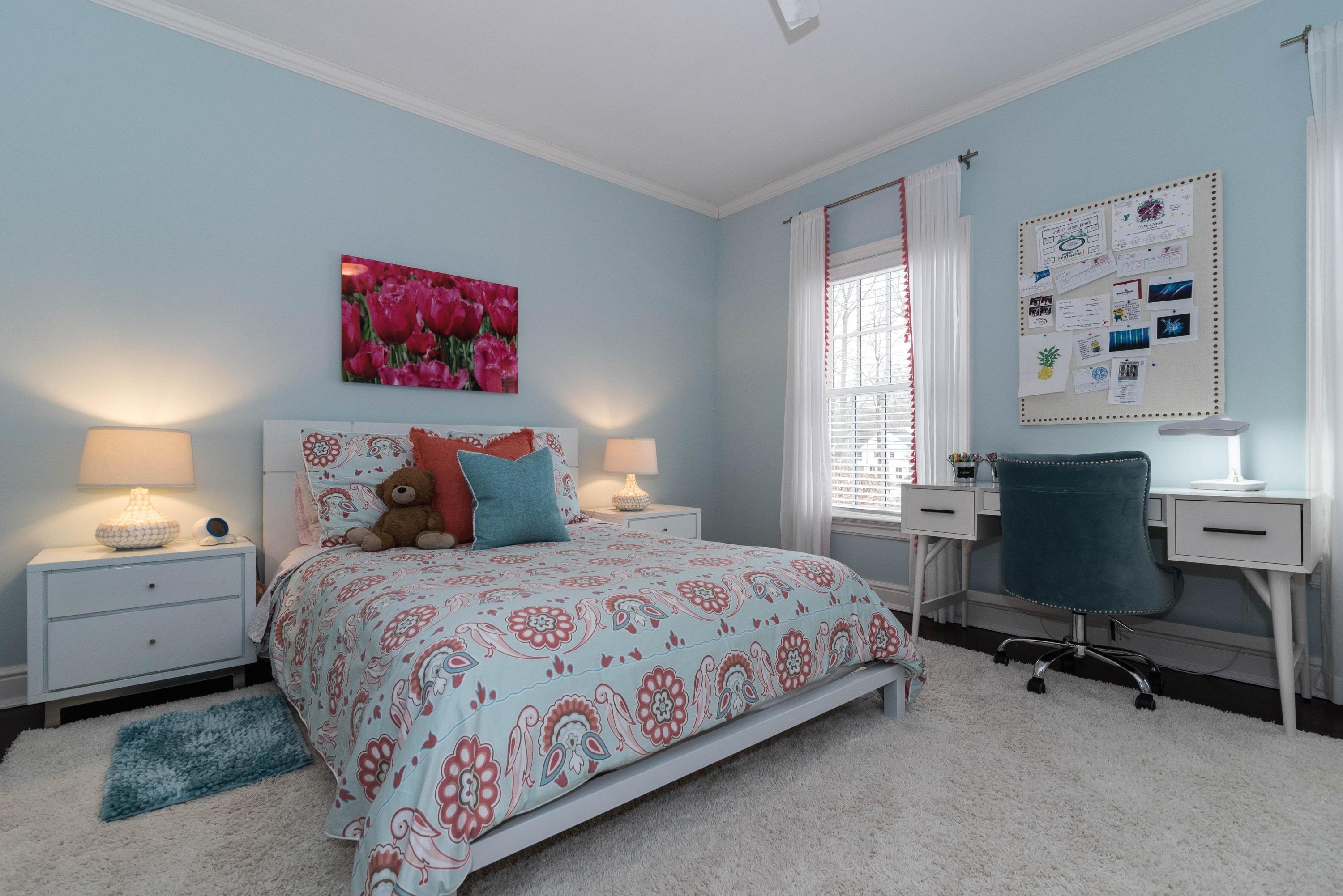 48 Leeuwarden Road Darien, CT 06820 - Photo 18 of 35 a bedroom with a bed and a desk